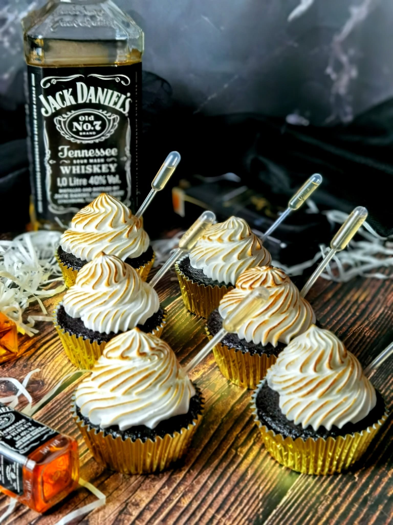Boozy gold-lined cupcakes with torched meringue by 21Treats